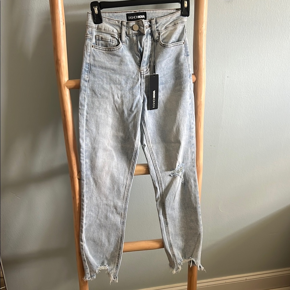 Fashion Nova High Rise Blue Jeans with Distressed Details